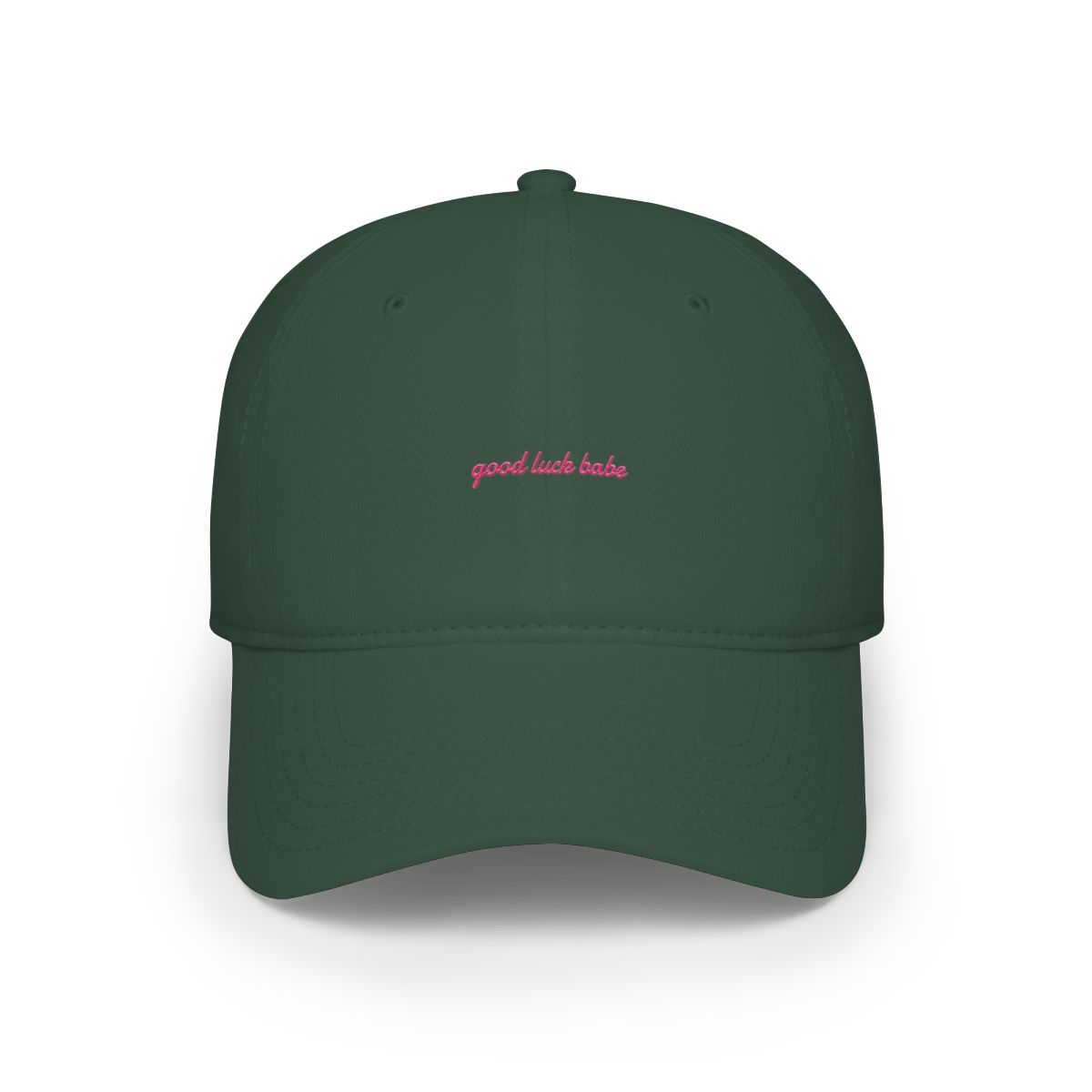 A pink baseball cap with the text "good luck babe" in pink on the front - Official Hats & Caps merchandise