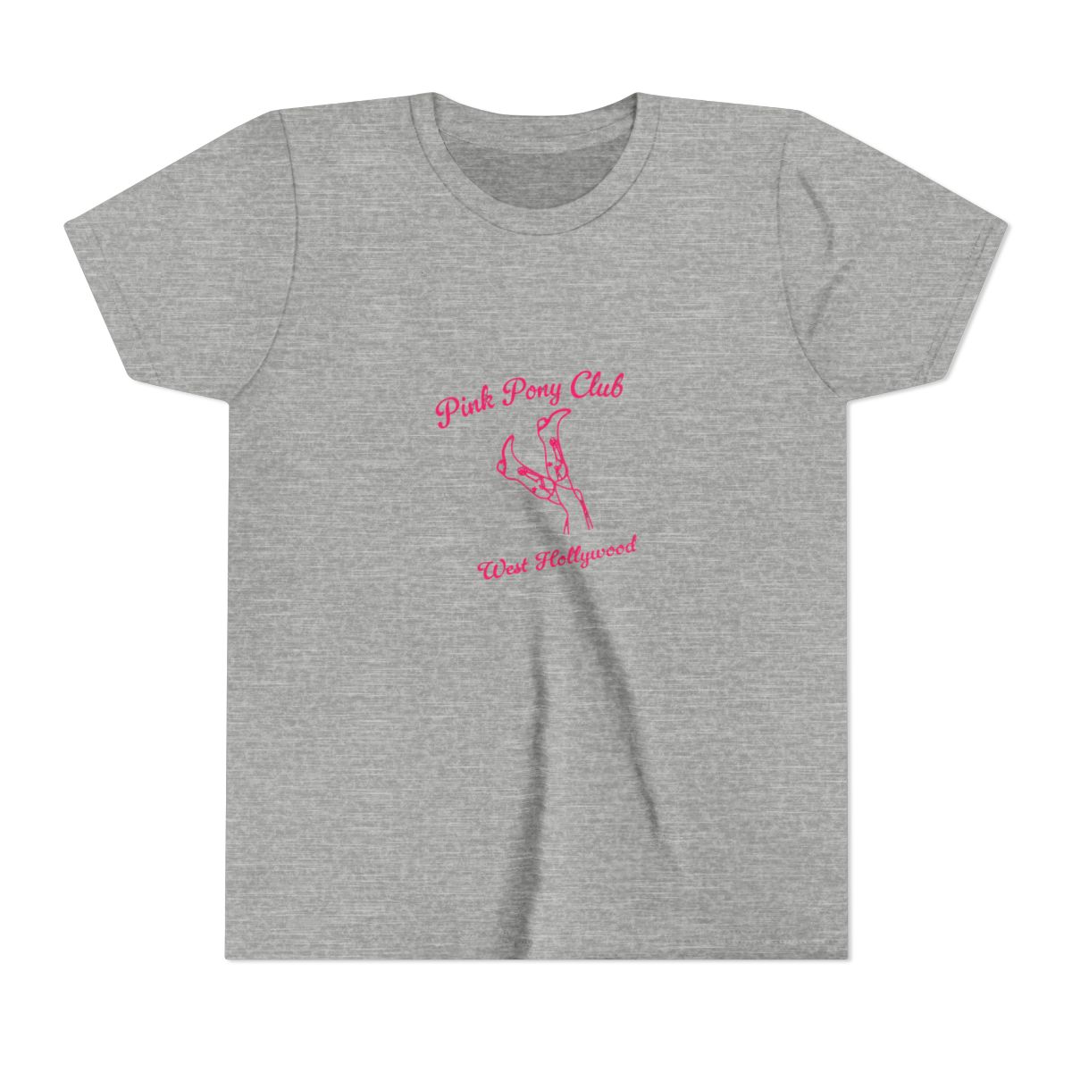 White T Shirt with the text "Pink Pony Club West Hollywood" in pink script. The shirt features a pink line drawing of legs and high heels. The shirt is folded and placed on a light surface (Kids)