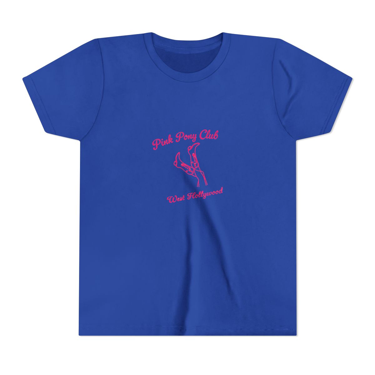 White T Shirt with the text "Pink Pony Club West Hollywood" in pink script. The shirt features a pink line drawing of legs and high heels. The shirt is folded and placed on a light surface (Kids) - alternate angle 4, merchandise